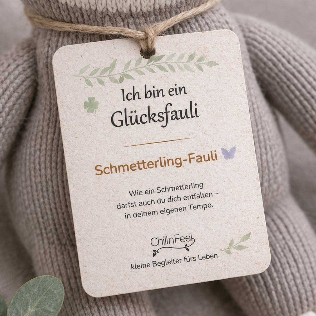 Hangtag am stofftier faultier Schmetterling-Fauli mit liebevoller Botschaft