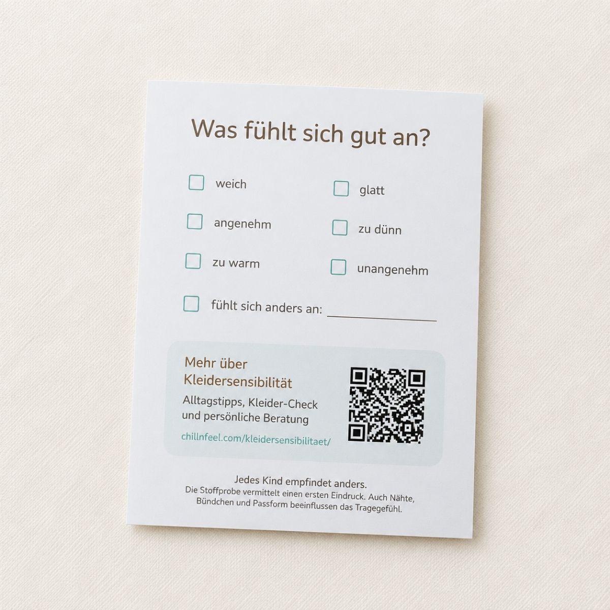 Rückseite der Pima Baumwolle Stoffprobe mit Ankreuzfeldern zum persönlichen Stoffempfinden